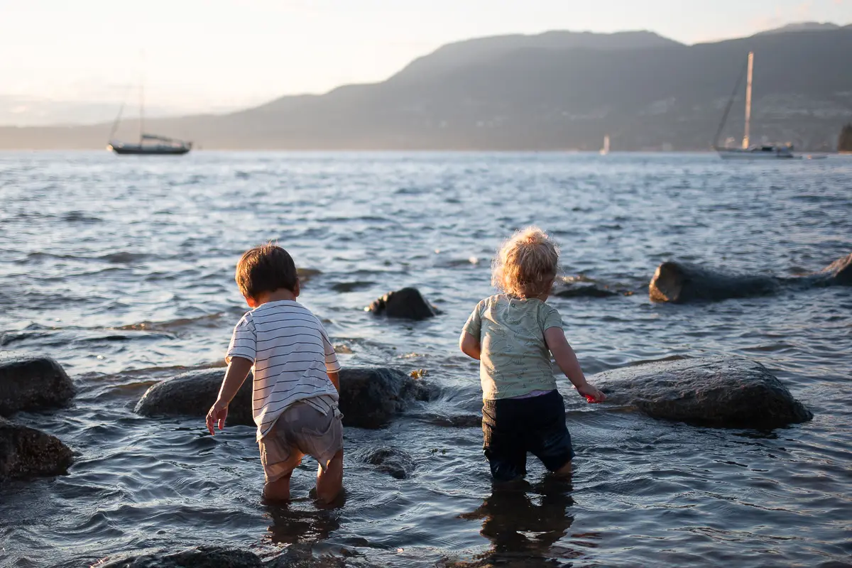 Two kids playing at the beach