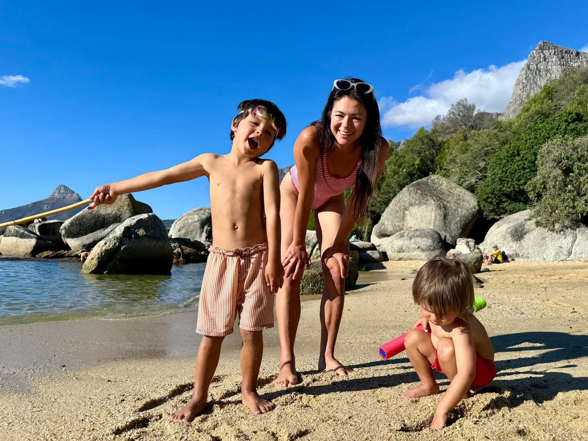 Kim and her boys playing in the water